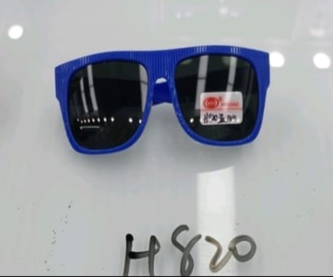 Blue sunglasses with a visible brand label on a white background