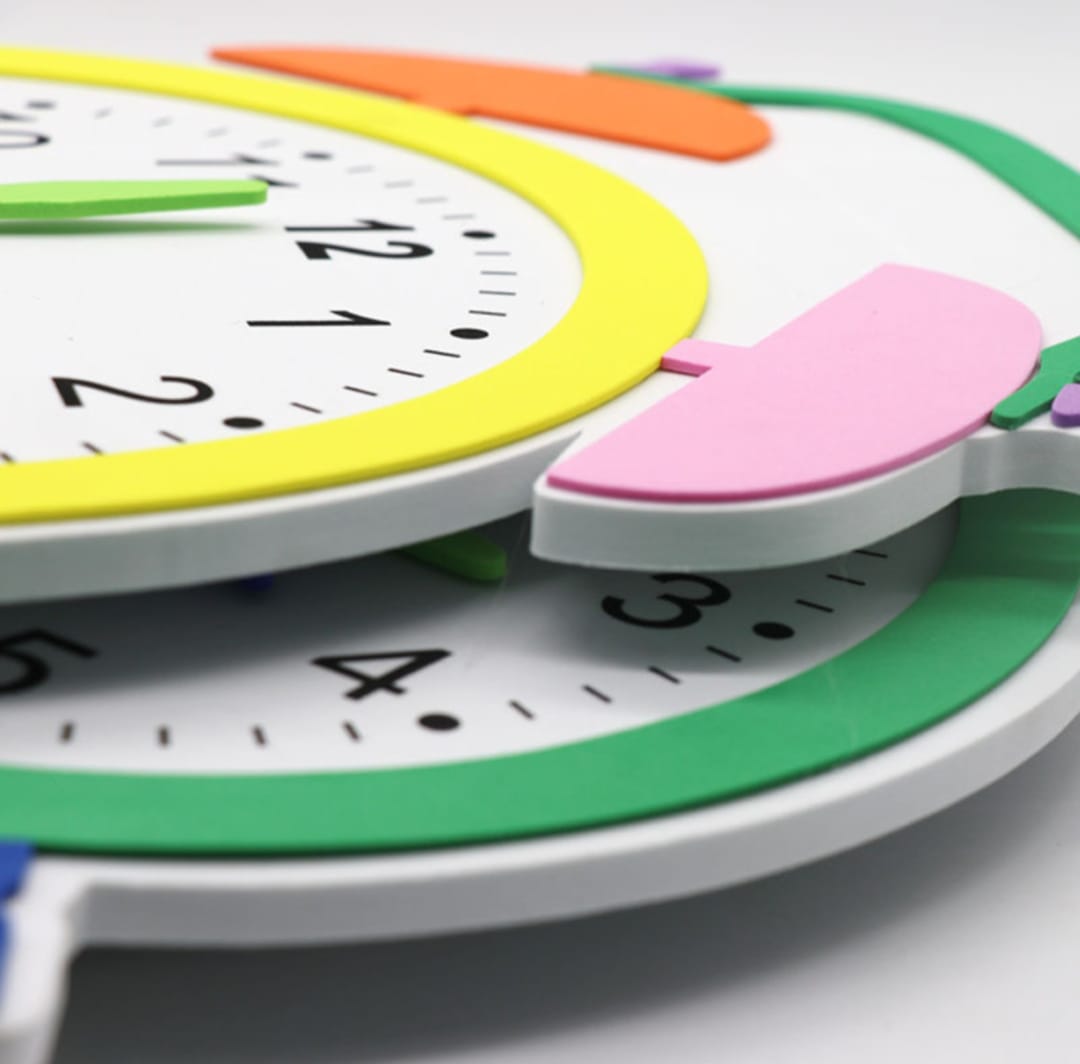 Classroom EVA Clock – Educational Wall Décor for Nurseries & Primary Classrooms

Make learning time fun and engaging with our Classroom EVA Clock, specially designed for nurseries, kindergartens, and early-grade classrooms. Crafted from high-quality EVA foam, this colorful, lightweight wall clock is not only decorative but also a great visual aid for teaching kids how to tell time.

With its bold numbers, movable hands, and vibrant design, it’s perfect for interactive learning and adds a playful touch to cl