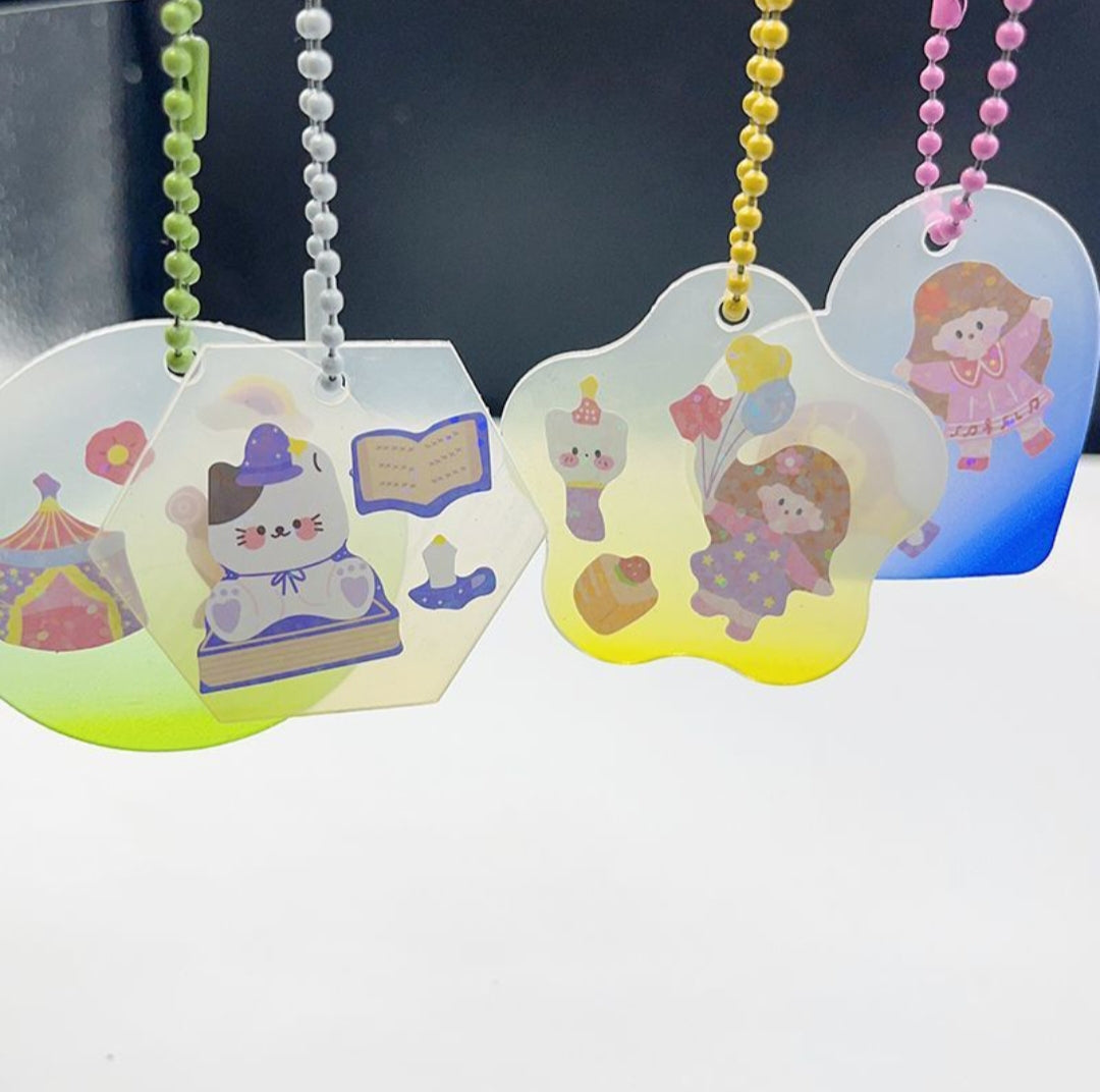 Colorful hanging tags with cartoon characters on a white background