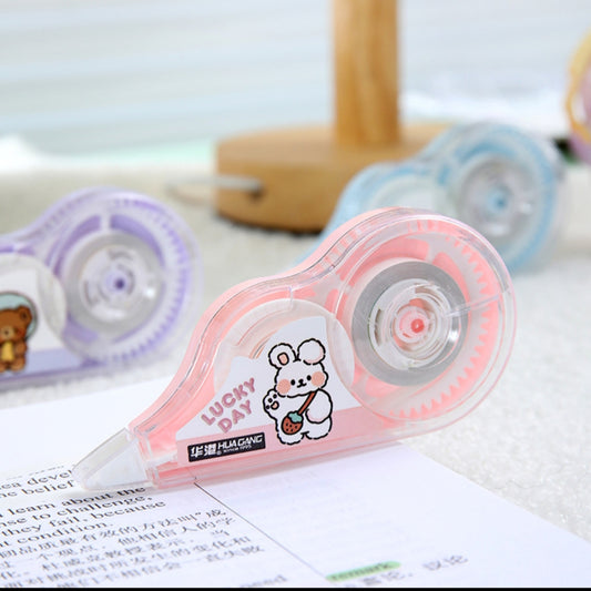 Correction tape with cartoon character design on a piece of paper