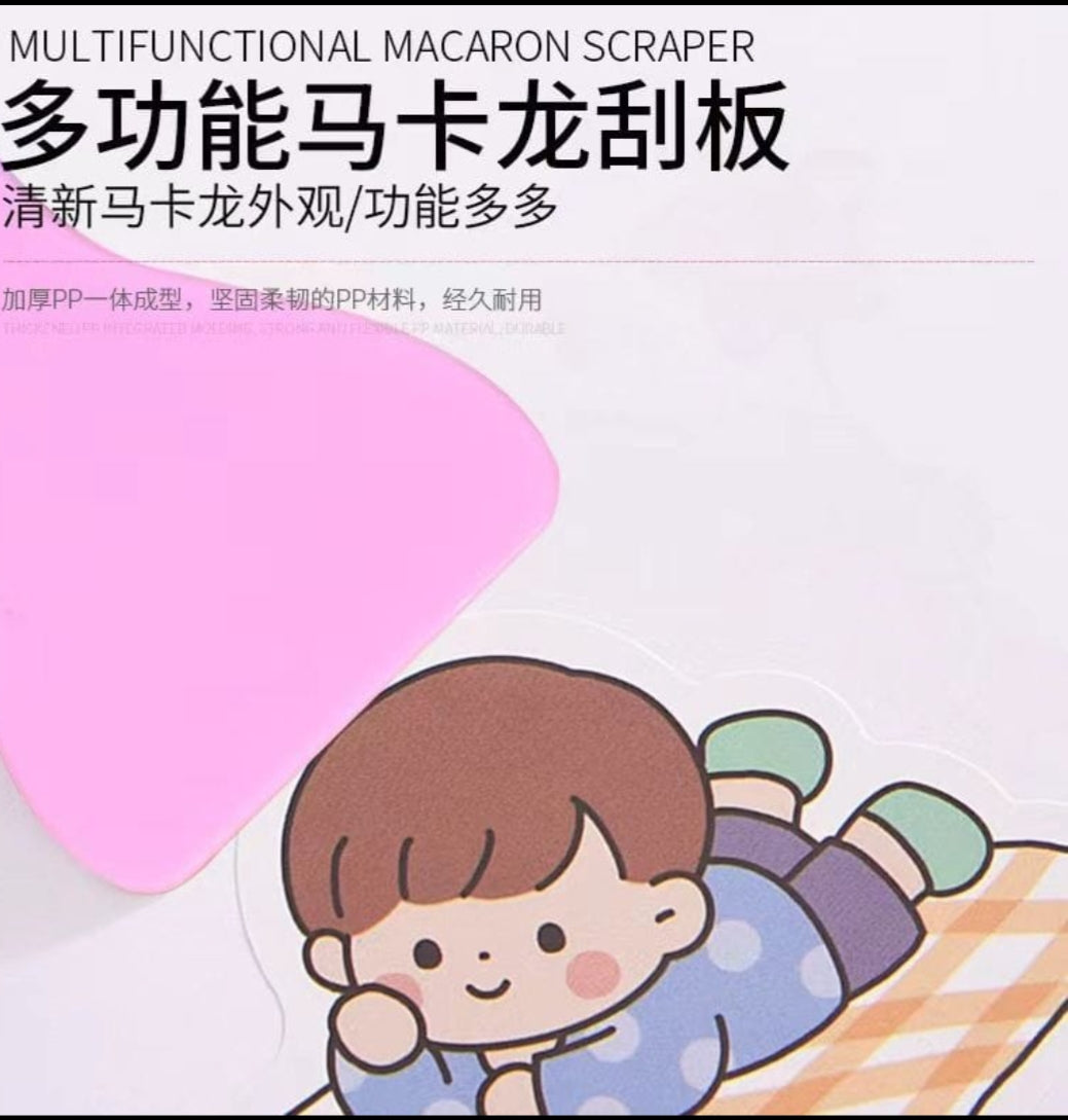 Multifunctional macaron scraper with cartoon character on a white background