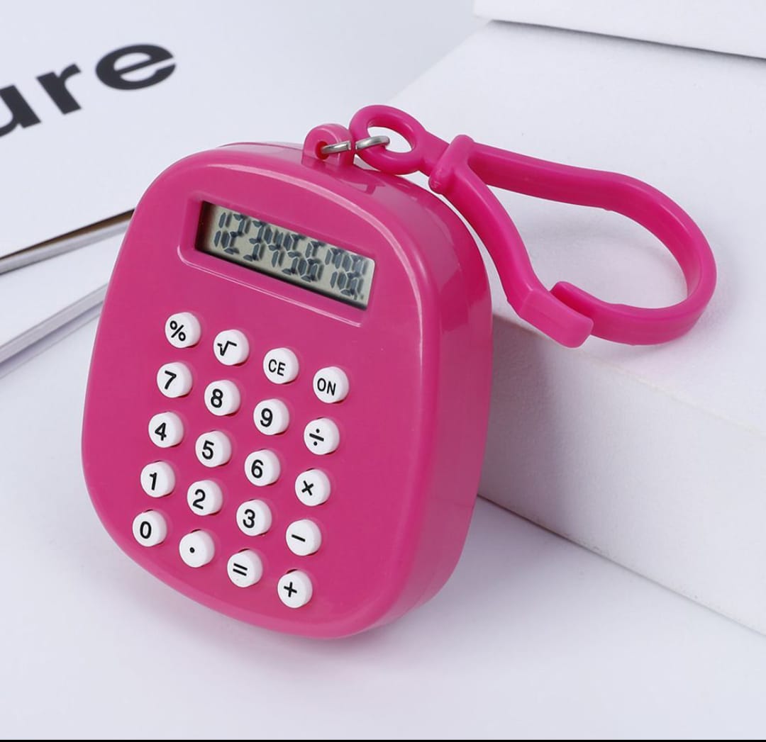 Pink calculator with keychain on a white background