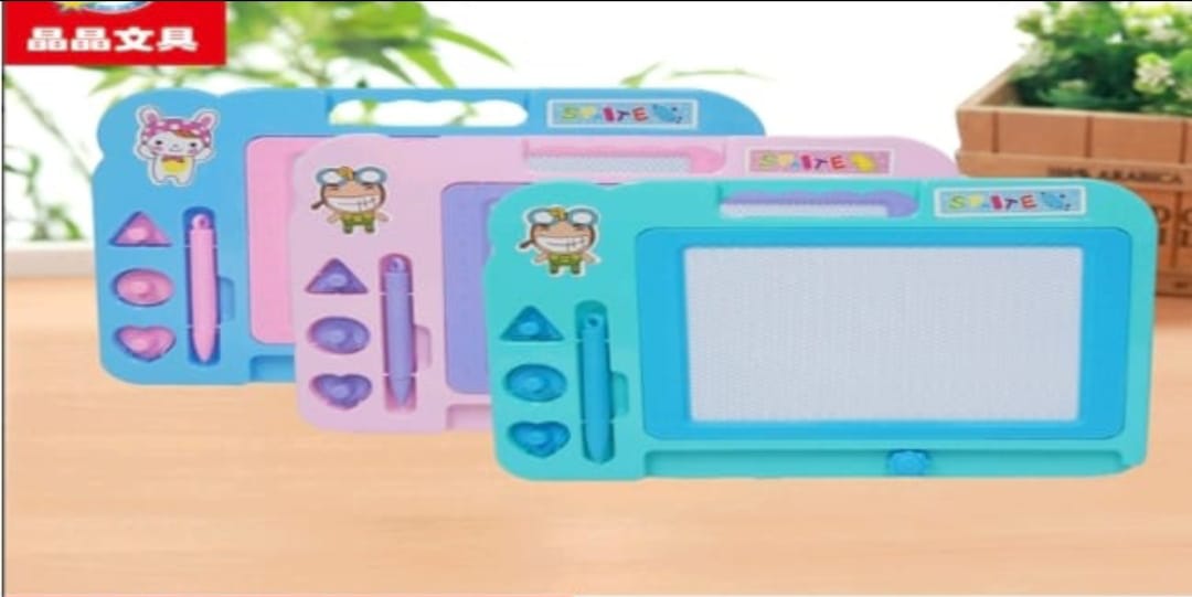 Set of children's drawing boards with cartoon designs on a wooden surface.