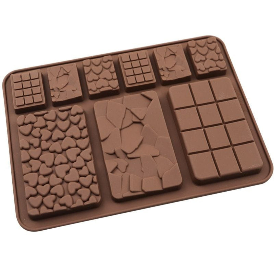 Chocolate mold with various shapes on a white background