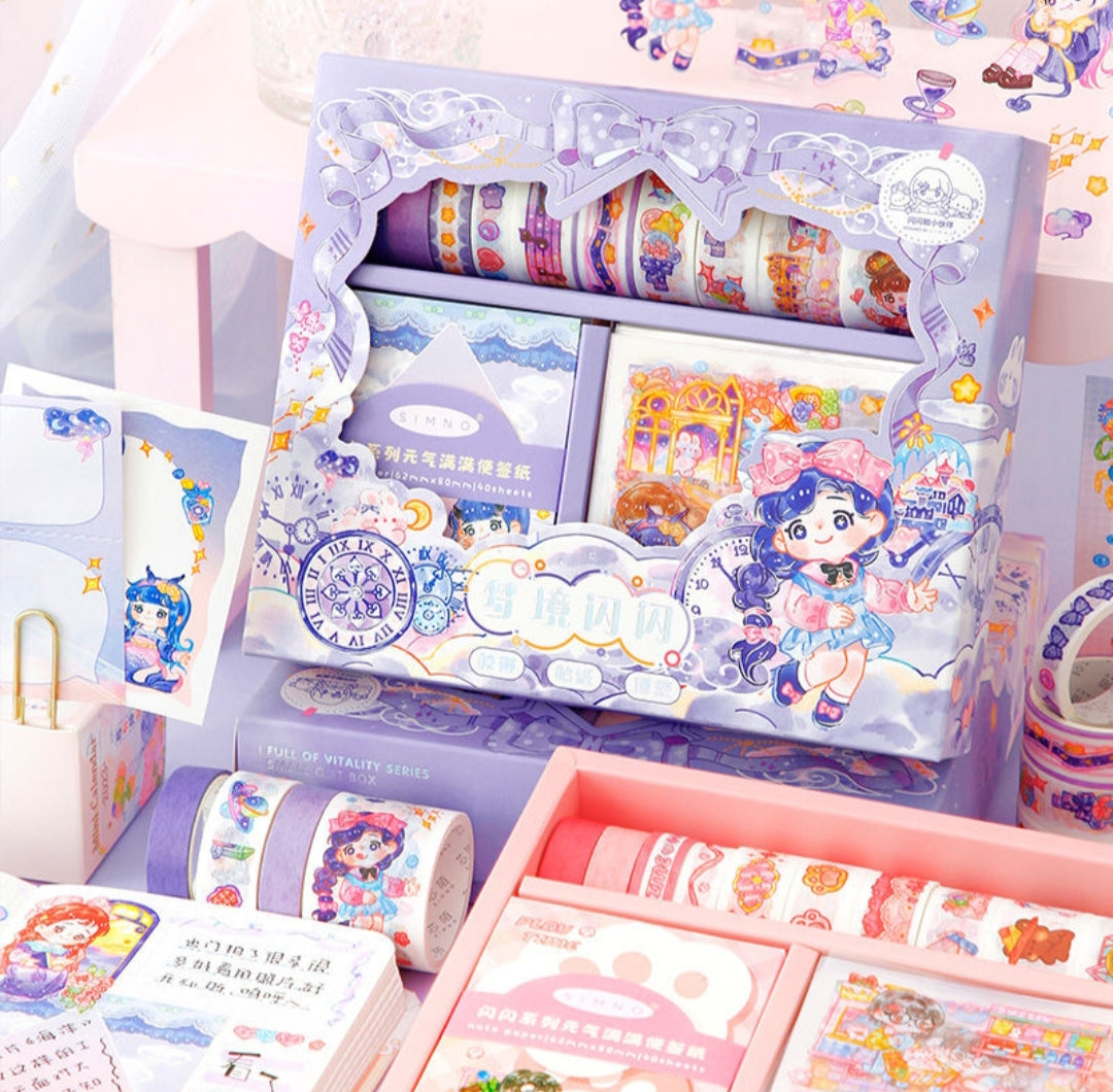 Colorful stationery set with cartoon character design, including tape rolls and packaging.
