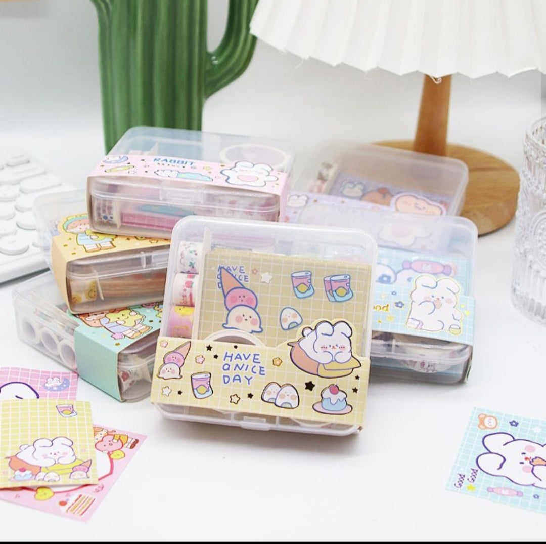 Set of colorful stationery items with cartoon designs on a white surface.