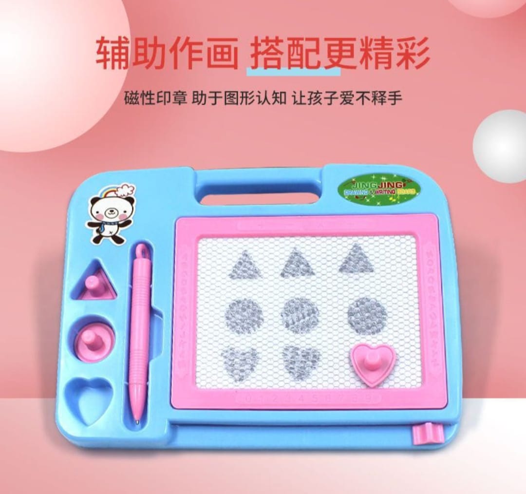 Children's drawing board with writing pad and pens on a pink background